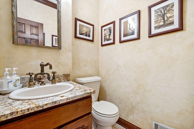 6242 131st Ave, Saugatuck, MI 49453 - half bathroom featuring vanity and toilet