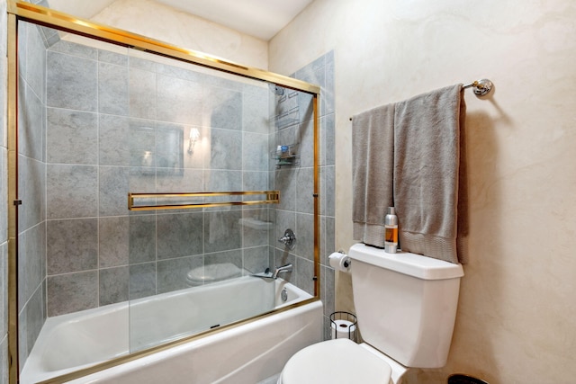 6242 131st Ave, Saugatuck, MI 49453 - bathroom featuring toilet and bath / shower combo with glass door