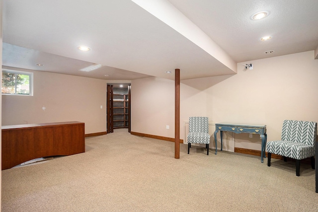 318 Houston Ave, Muskegon, MI 49441 - basement with light colored carpet, baseboards, and recessed lighting