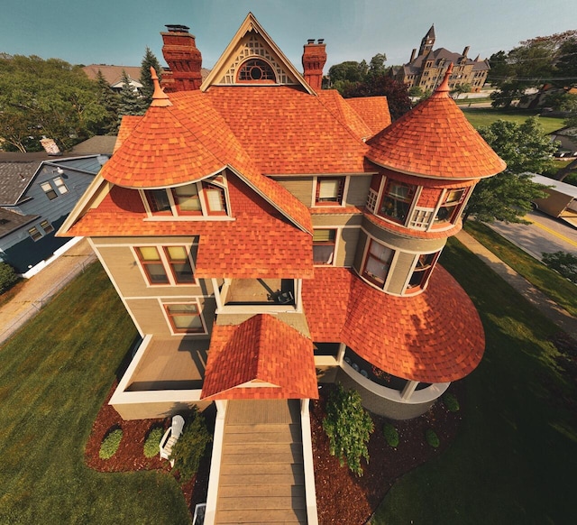 318 Houston Ave, Muskegon, MI 49441 - view of front of home with a chimney