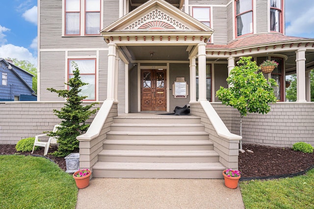 318 Houston Ave, Muskegon, MI 49441 - property entrance with a porch