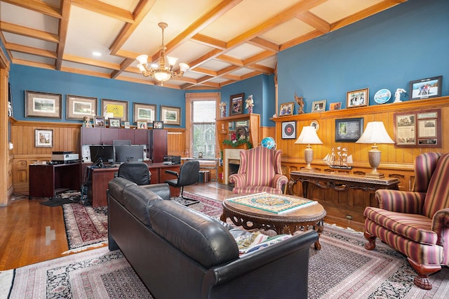318 Houston Ave, Muskegon, MI 49441 - living room with a chandelier, coffered ceiling, wood finished floors, beam ceiling, and a desk