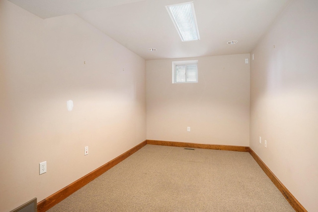 318 Houston Ave, Muskegon, MI 49441 - unfurnished room with light colored carpet and baseboards