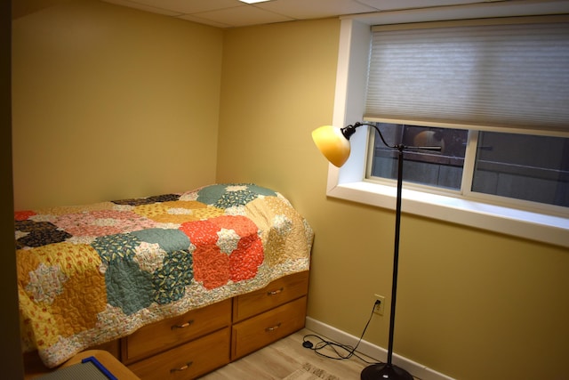 226 N 176th Ave, Walkerville, MI 49459 - bedroom with baseboards and light wood-style flooring