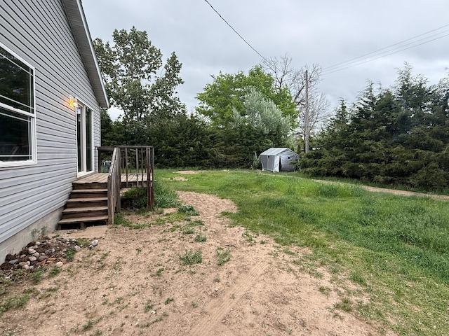 212 Cass St, Mio, MI 48647 - view of yard featuring a wooden deck