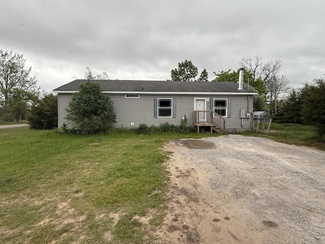 212 Cass St, Mio, MI 48647 - manufactured / mobile home with a front lawn