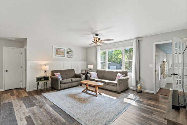 2980 N Old State Rd, Weidman, MI 48893 - living area featuring ceiling fan, wood finished floors, and baseboards