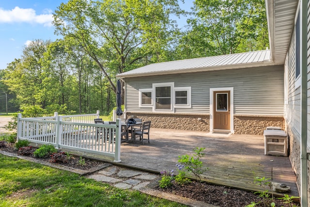 2980 N Old State Rd, Weidman, MI 48893 - wooden terrace featuring outdoor dining space
