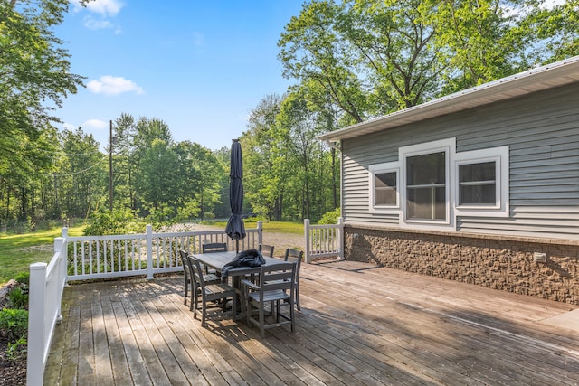 2980 N Old State Rd, Weidman, MI 48893 - wooden terrace featuring outdoor dining area