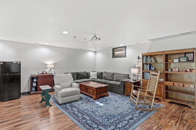 2980 N Old State Rd, Weidman, MI 48893 - living room with wood finished floors and recessed lighting