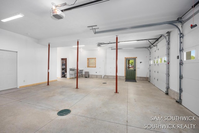 1034 Thompson St SW, Stanton, MI 48888 - garage with a garage door opener