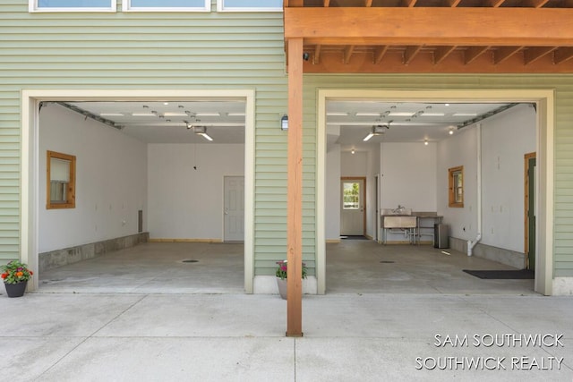 1034 Thompson St SW, Stanton, MI 48888 - garage with concrete driveway