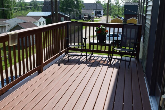 1034 Thompson St SW, Stanton, MI 48888 - deck with a residential view