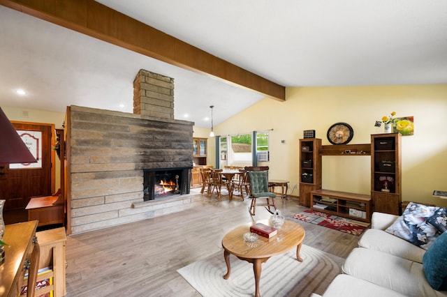 275 Benjamin St, Benton Harbor, MI 49022 - living room featuring a multi sided fireplace, wood finished floors, and recessed lighting