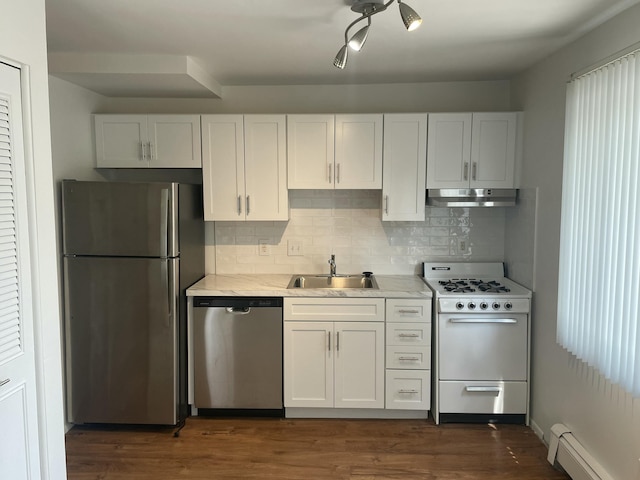 620 E Lincoln Ave Unit 7, Royal Oak, MI 48067 - kitchen featuring stainless steel appliances, baseboard heating, under cabinet range hood, white cabinets, and decorative backsplash