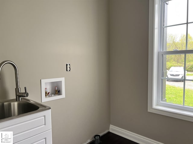 3801 Sutton Rd, Metamora, MI 48455 - washroom with hookup for a washing machine, cabinet space, and baseboards