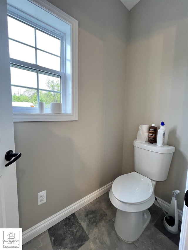 3801 Sutton Rd, Metamora, MI 48455 - bathroom with baseboards and toilet