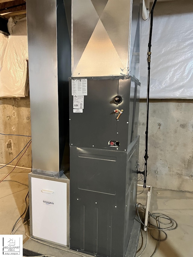 3801 Sutton Rd, Metamora, MI 48455 - utility room featuring heating unit