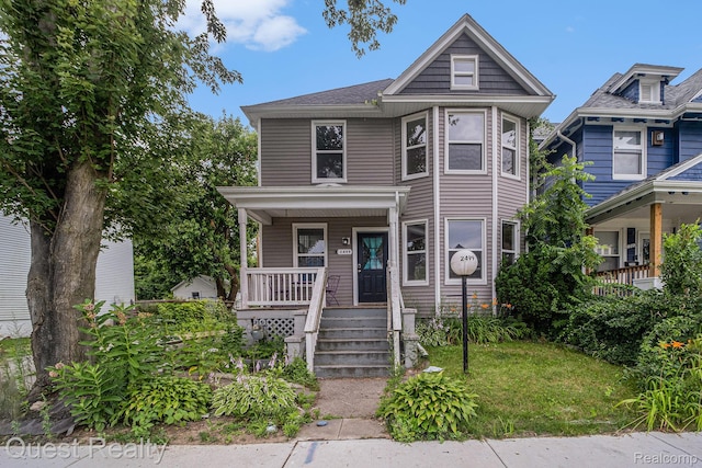2499 Baldwin St, Detroit, MI 48214 - view of front of home with a porch