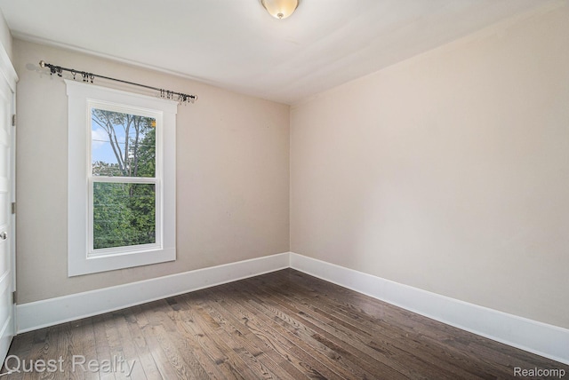 2499 Baldwin St, Detroit, MI 48214 - unfurnished room featuring dark wood finished floors and baseboards