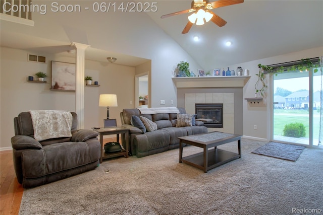 31626 Beaver Cir, New Boston, MI 48164 - living room with a ceiling fan, a fireplace, and high vaulted ceiling