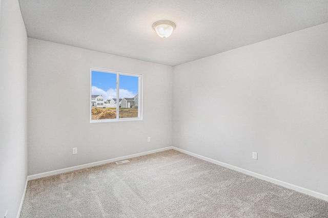 608 Arizona Blvd, Three Rivers, MI 49093 - empty room featuring carpet flooring and baseboards