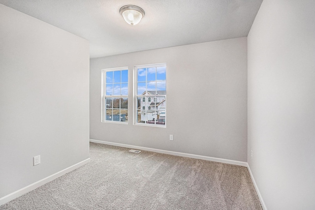608 Arizona Blvd, Three Rivers, MI 49093 - carpeted spare room featuring baseboards