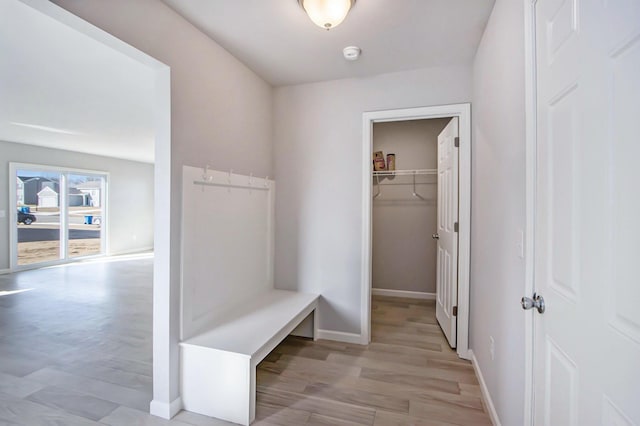 608 Arizona Blvd, Three Rivers, MI 49093 - mudroom featuring baseboards and light wood-type flooring