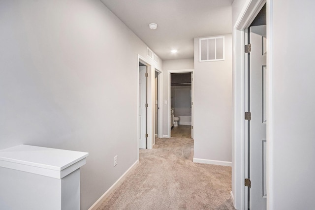 608 Arizona Blvd, Three Rivers, MI 49093 - corridor with light colored carpet, baseboards, and recessed lighting
