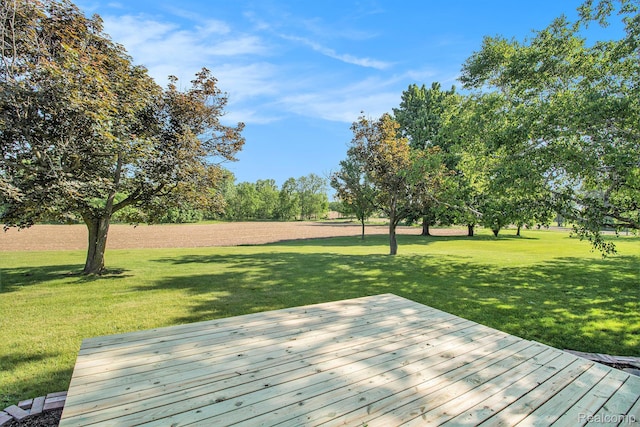 12105 Hegel Rd, Goodrich, MI 48438 - wooden deck with a yard