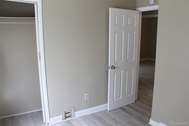 15504 Chelsea, Redford, MI 48239 - unfurnished bedroom featuring wood finished floors, baseboards, and a closet