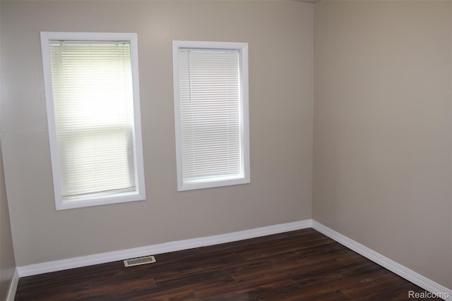 15504 Chelsea, Redford, MI 48239 - unfurnished room featuring dark wood-style flooring, baseboards, and healthy amount of natural light