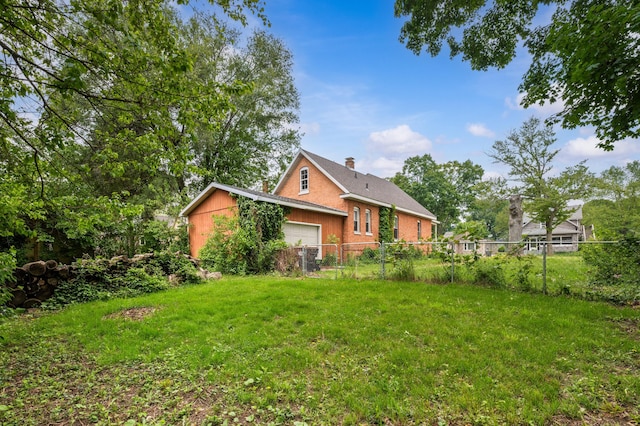 920 Wisconsin Ave, Saint Joseph, MI 49085 - view of yard with a garage