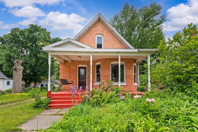 920 Wisconsin Ave, Saint Joseph, MI 49085 - view of front of property with brick siding and a porch