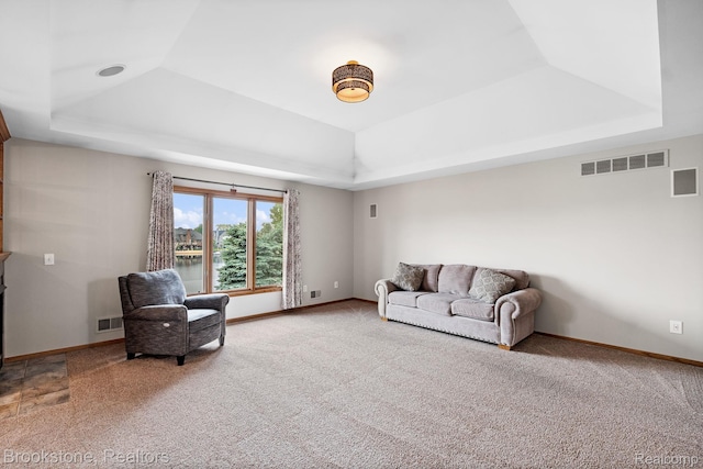 26569 Autumn Lake Dr, Chesterfield, MI 48051 - carpeted living area with a raised ceiling and baseboards