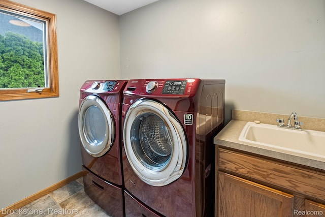 26569 Autumn Lake Dr, Chesterfield, MI 48051 - washroom with separate washer and dryer, baseboards, and cabinet space