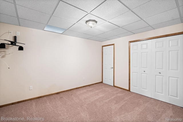 26569 Autumn Lake Dr, Chesterfield, MI 48051 - unfurnished bedroom featuring carpet floors, baseboards, a closet, and a drop ceiling