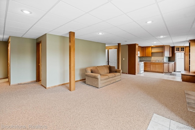 26569 Autumn Lake Dr, Chesterfield, MI 48051 - unfurnished living room with light colored carpet, recessed lighting, baseboards, a paneled ceiling, and wet bar
