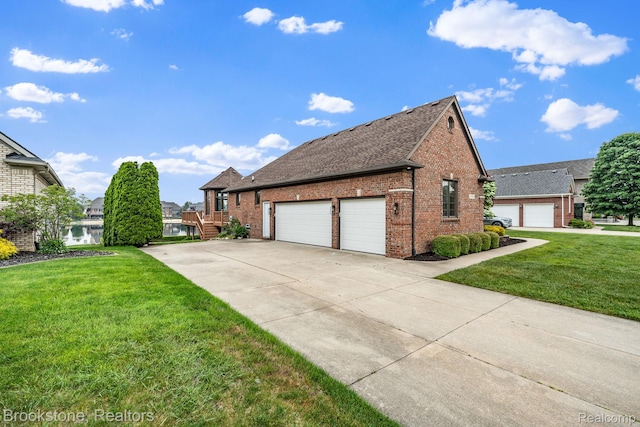 26569 Autumn Lake Dr, Chesterfield, MI 48051 - view of side of home with brick siding, driveway, a garage, and a lawn