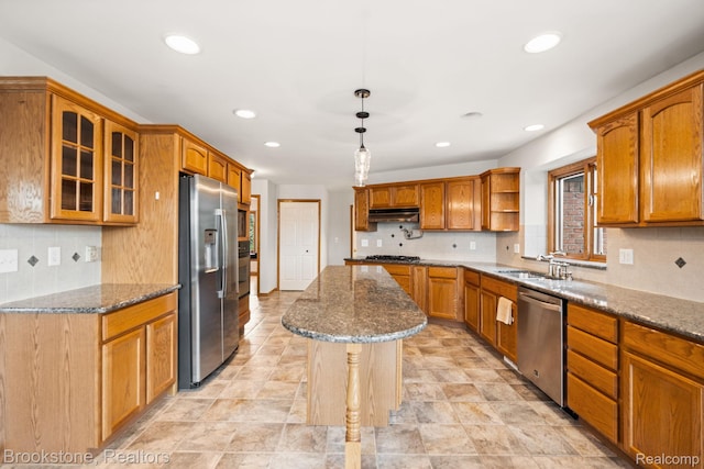 26569 Autumn Lake Dr, Chesterfield, MI 48051 - kitchen featuring stainless steel appliances, under cabinet range hood, decorative backsplash, recessed lighting, and a sink