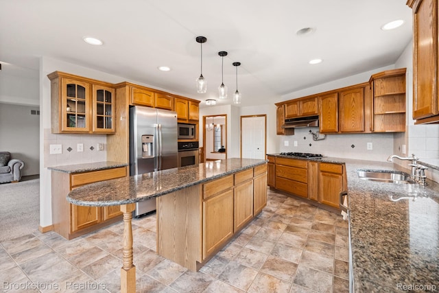 26569 Autumn Lake Dr, Chesterfield, MI 48051 - kitchen with stainless steel appliances, a kitchen island, a sink, brown cabinetry, and backsplash