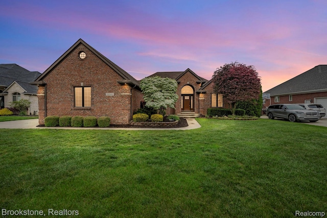 26569 Autumn Lake Dr, Chesterfield, MI 48051 - french provincial home featuring a lawn and brick siding