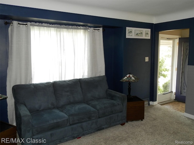 25207 Fortuna St, Roseville, MI 48066 - living room featuring carpet flooring and baseboards