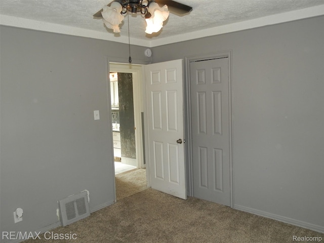 25207 Fortuna St, Roseville, MI 48066 - carpeted empty room with ceiling fan and a textured ceiling