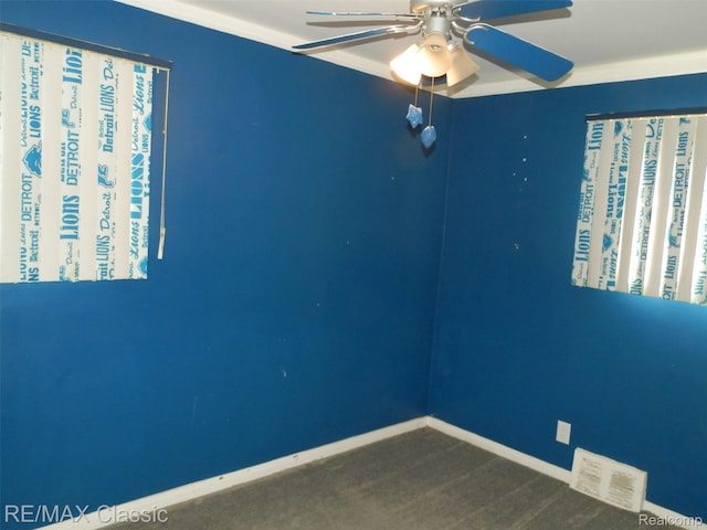 25207 Fortuna St, Roseville, MI 48066 - unfurnished room with a ceiling fan, baseboards, and dark colored carpet
