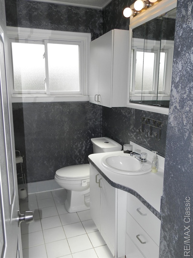 25207 Fortuna St, Roseville, MI 48066 - bathroom featuring tile patterned floors, vanity, toilet, and wallpapered walls