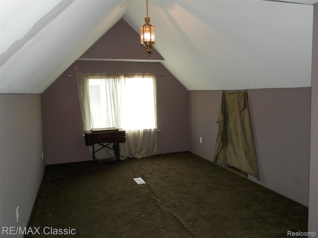25207 Fortuna St, Roseville, MI 48066 - additional living space with vaulted ceiling and carpet flooring