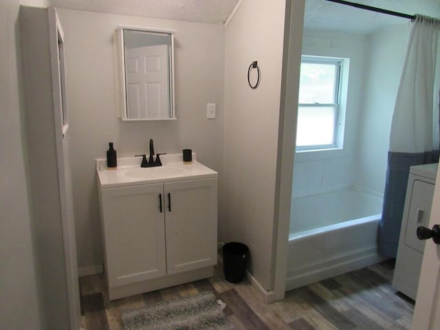 18051 Fuller St, Vandalia, MI 49095 - full bath featuring vanity, wood finished floors, and a textured ceiling