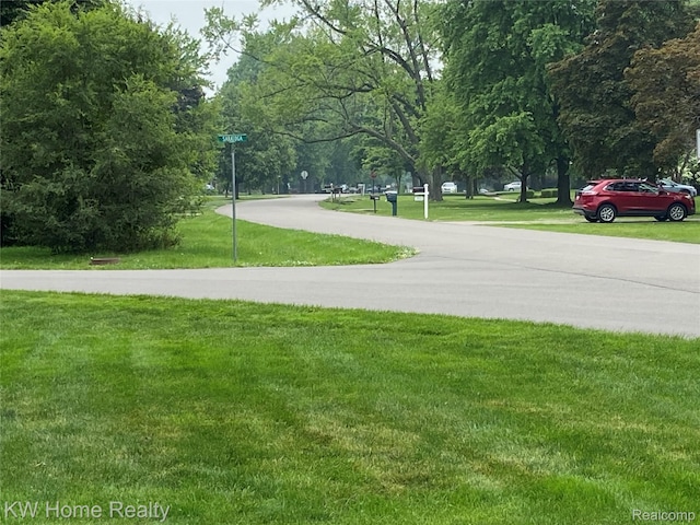 27943 Sunset Blvd W, Lathrup Village, MI 48076 - view of community featuring a lawn