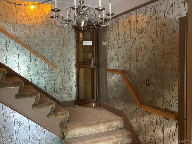 27943 Sunset Blvd W, Lathrup Village, MI 48076 - stairs with wallpapered walls and a chandelier